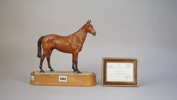 A Royal Worcester porcelain model of Arkle, Ltd edition 106/500 by Doris Linder, on a wooden base, with certificate, 26cm high overall.