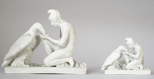 A Copenhagen biscuit porcelain figure group, 19th century, depicting Ganymede and the eagle blue painted mark to base, stamped Eneret A, 26cm wide and
