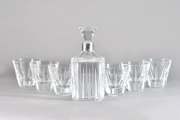 An Asprey glass and silver mounted decanter and stopper with six matching tumblers, etched mark 'Asprey London' with hallmark to silver collar, boxed.
