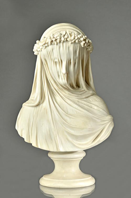 A Copeland parian bust of `The Bride', circa 1861, modelled by Raphaelle Monti for the Crystal Palace Art Union, raised on a socle base, impressed and