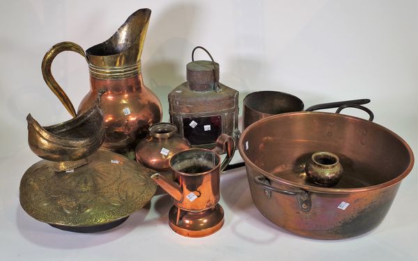 A quantity of mostly 19th century brass and copper wares, including; jugs, pots, pans and a late 17th century brass and iron warming pan, (qty). S5B