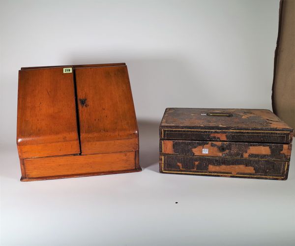 A 19th century oak slope fronted stationery box, 41cm wide x 36cm high, a 19th century leather bound travelling writing slope, (a.f.), 40cm wide x 17c