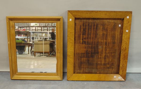 An early 20th century pine rectangular wall mirror, 54cm wide x 65cm high, and a Victorian birds eye maple framed mirror, 62cm wide x 72cm high, (2).