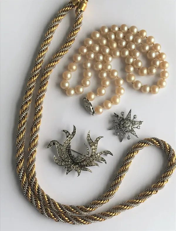 A small collection of costume jewellery, comprising:  a late 19th/early 20th century colourless paste set star brooch, set in white metal (presumed si