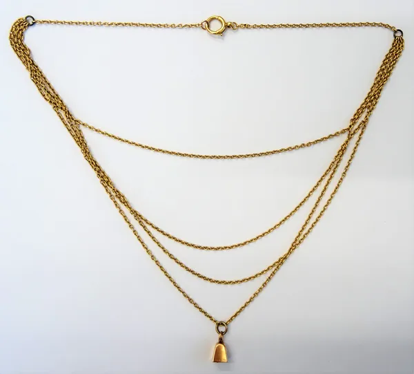 A gold necklace, the front in a four row graduated oval link design, detailed 15, on a boltring clasp, the front fitted with a gold four sided bell ch