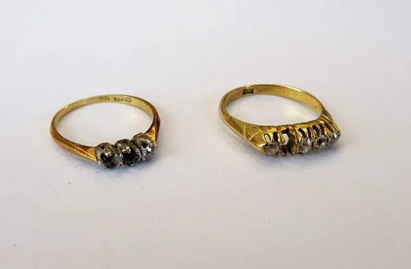 A gold ring, mounted with four colourless gems, comprising two diamonds and two pastes, detailed 18 CT and a gold ring, mounted with a cushion shaped