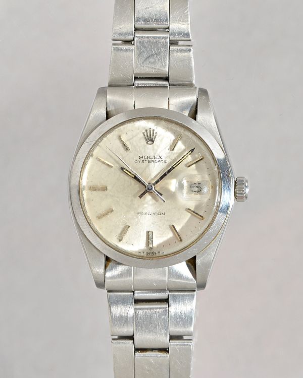 A Rolex Oysterdate Precision steel cased gentleman's bracelet wristwatch, the signed silvered dial with baton numerals, Rolex crown at 12 o'clock, dat