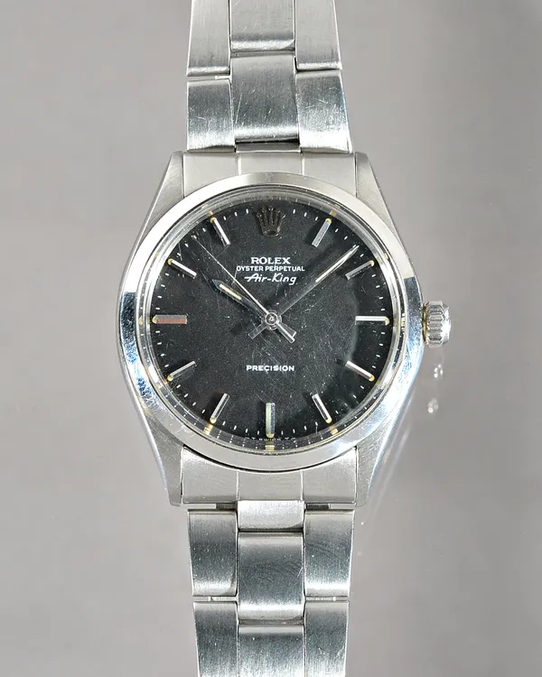 A Rolex Air King Oyster Perpetual Precision steel gentleman's bracelet wristwatch, the signed black dial with baton numerals and with centre seconds,