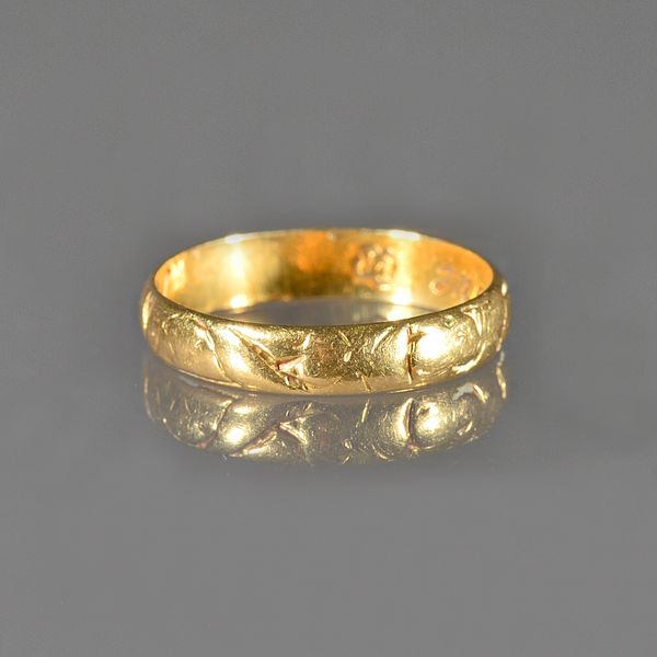 A gold motto or betrothal ring, detailed within the band 'Not the value, but my loue', maker's mark P R, ring size I, weight 2 gms. Illustrated.