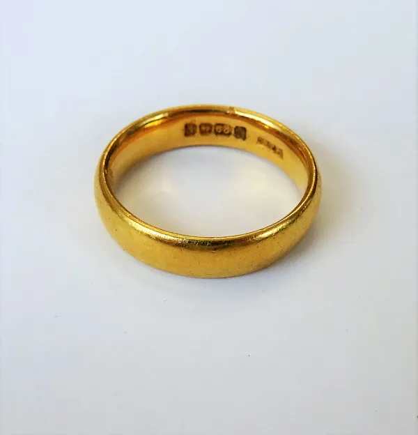 A 22ct gold plain wedding ring, Birmingham 1929, ring size J and a half, weight 5.3 gms.