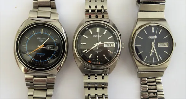 A Seiko Bell-Matic steel gentleman's bracelet wristwatch, a Seiko 5 Sports steel gentleman's bracelet wristwatch and a Seiko Automatic steel gentleman