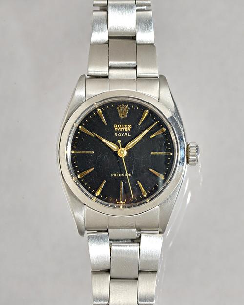 A Rolex Oyster Royal Precision steel gentleman's bracelet wristwatch, the signed black dial with gilt baton numerals, gilt hands and with centre secon