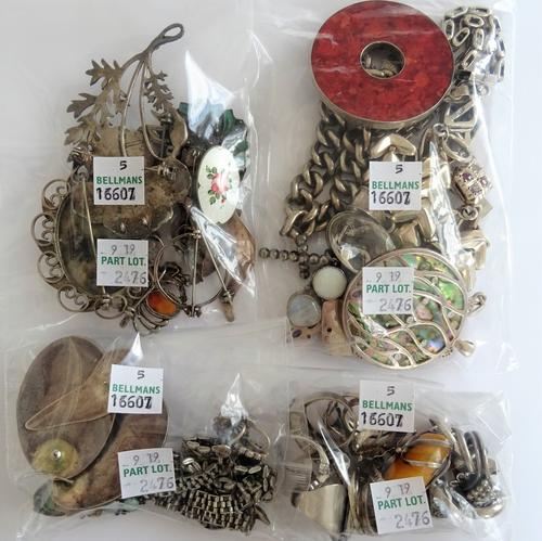 A group of mostly silver mounted jewellery, comprising; a curb link bracelet with a heart shaped padlock clasp, three further bracelets, eight pendant