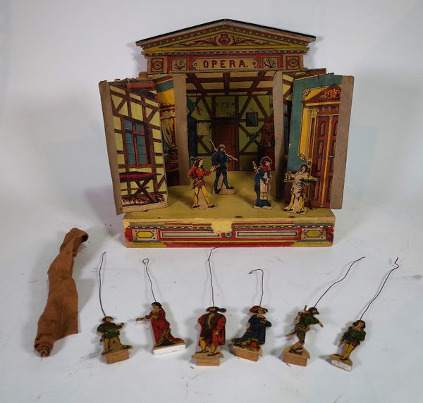 An early 20th century miniature painted puppet theatre back drop, (a.f.) 32cm wide x 32cm high. S5T