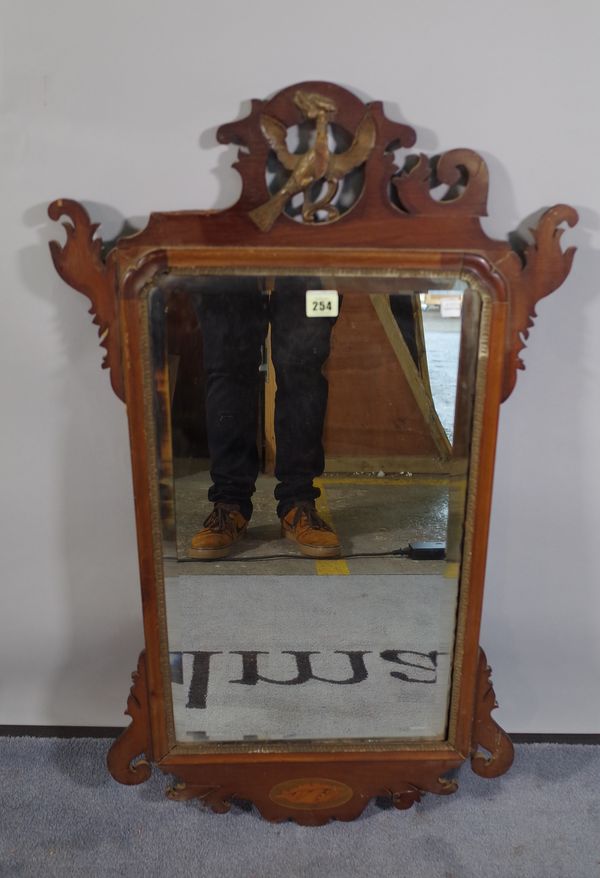 A George III mahogany framed pier mirror with ho ho bird crest, 53cm wide x 90cm high.