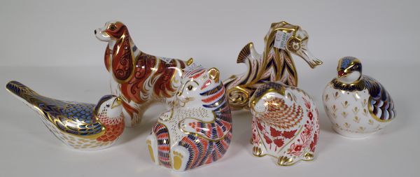 Six Royal Crown Derby Imari paperweights including a partridge, blue bird, seahorse, spaniel, beaver, tiger cub, all boxed, (6).