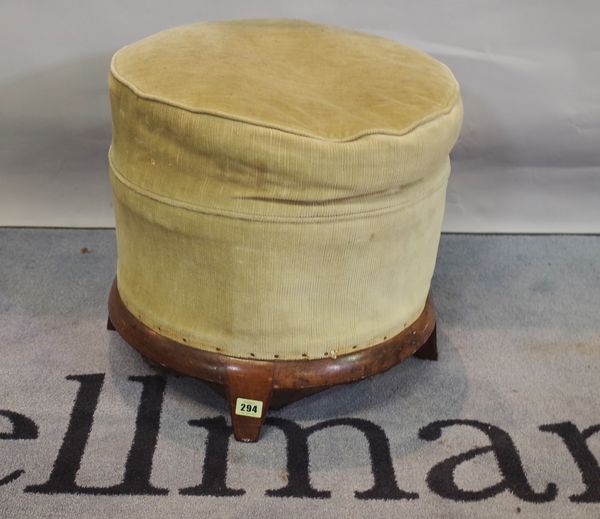 A rosewood framed circular footstool on four splayed sqaure supports, 46cm diameter.