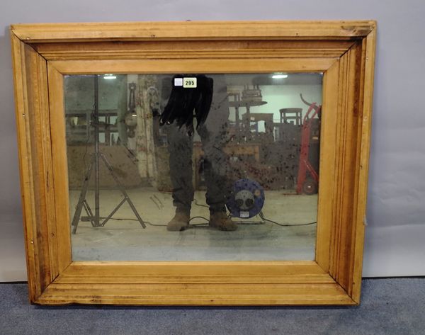 A rectangular pine wall mirror with moulded frame, 86cm wide x 71cm high.