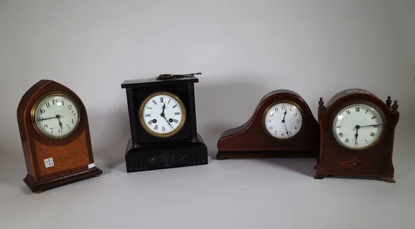 A group of three French clocks, including a mahogany lancet shaped mantel clock, a Belgium slate mantel clock and a mahogany arched mantel clock, (3).
