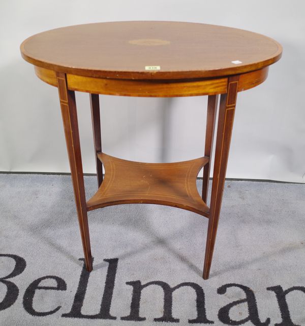 An Edwardian satinwood banded oval occasional table on square tapering supports, 67cm wide x 70cm high.