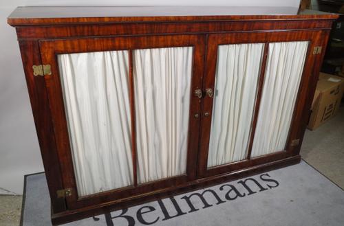 A 19th century mahogany glazed side cabinet on plinth base, 184cm wide x 114cm high.
