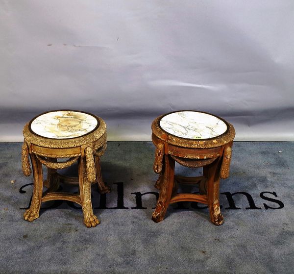 A pair of 19th century Continental swag mounted urn stands on claw feet, 37cm wide x 44cm high, (a.f.).