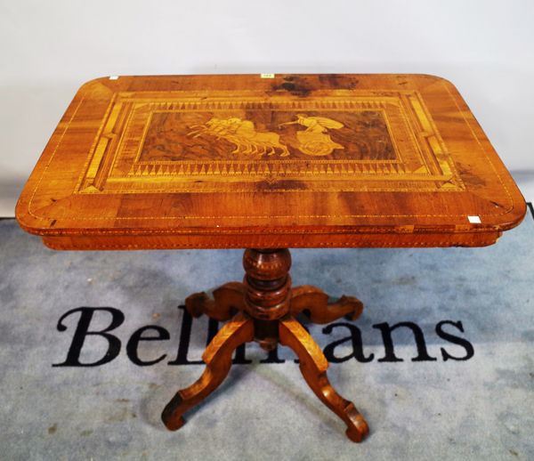 A Victorian mahogany and satinwood inlaid centre table on four outswept supports, 89cm wide x 79cm high.