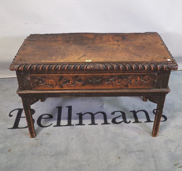 An 18th century Continental oak single drawer low side table, 99cm wide x 64cm high.