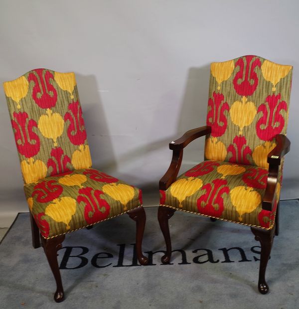 A set of ten 20th century upholstered highback dining chairs on cabriole suppports to include two carvers, (10).