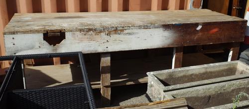 An early 20th century pine two tier work bench, 259cm wide x 88cm high, (a.f.).