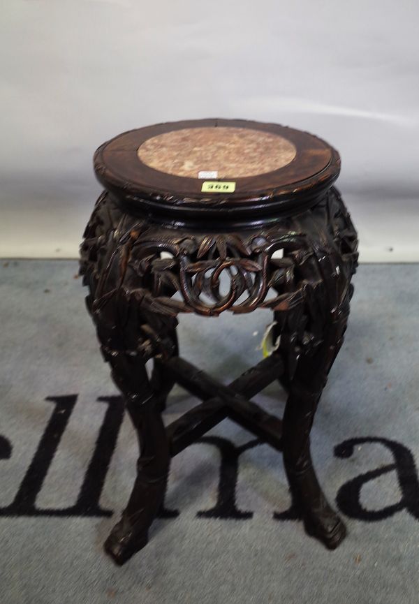 A 20th century Chinese hardwood jardiniere stand with inset marble top, 32cm wide x 50cm high.