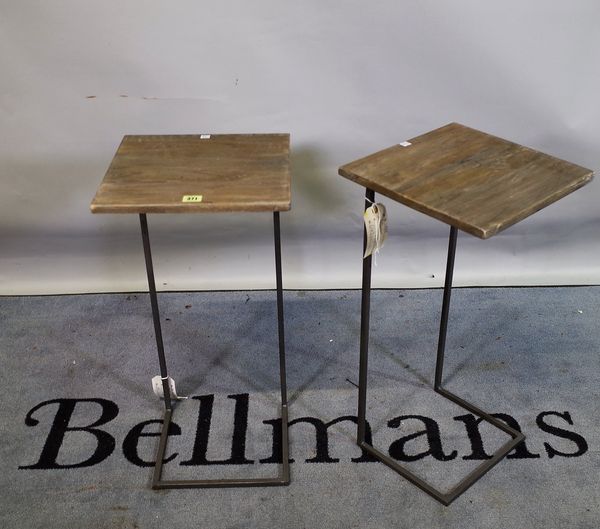 French Connection; a pair of 20th century square occasional tables with hardwood tops on metal bases, 33cm wide x 67cm high.