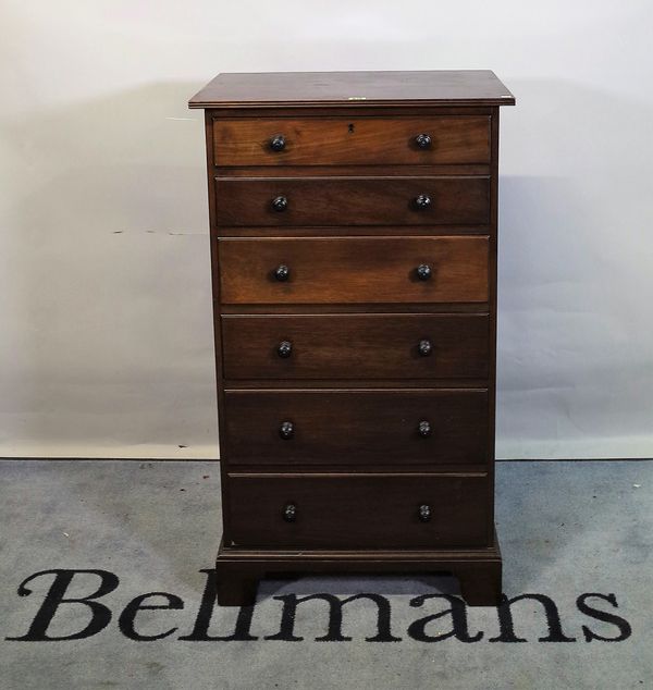 An early 20th century mahogany tall chest of six long graduated drawers on bracket feet, 61cm wide x 103cm high.