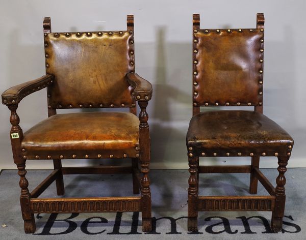 A set of six 18th century style oak dining chairs with studded leather upholstery to include two carver chairs, (6).