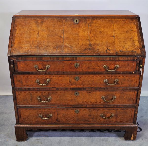 An 18th century inlaid walnut bureau, the fitted interior over four long graduated drawers, on bracket feet, 108cm wide x 111cm high.