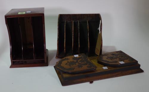 An Edwardian rosewood and inlaid stationery rack, 17cm wide x 26cm high, a Victorian rosewood and metal bookend and an early 20th century faux crocodi