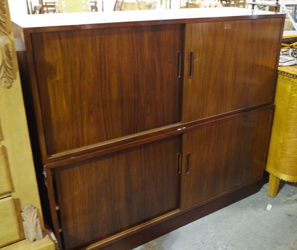 Danish furniture: a 20th century mahogany side cabinet with two pairs of sliding doors, 138cm wide x 112 cm high.