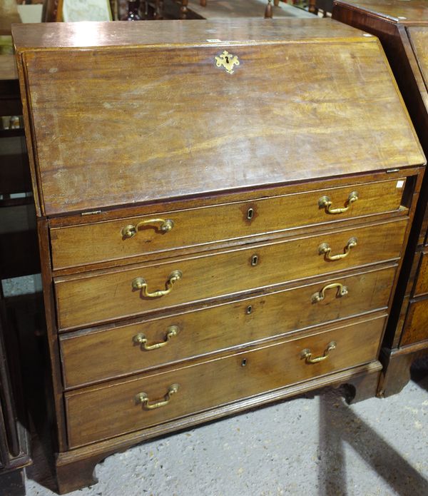 A George III mahogany bureau, the fall over four long drawers on bracket feet, 92cm wide x 105cm high.