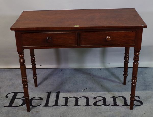 A Victorian mahogany two drawer side table on ring turned tapering supports, 100cm wide x 78cm high.