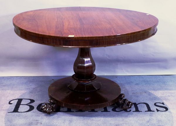 A 19th century rosewood circular tilt top table, 105cm wide x 80cm high.