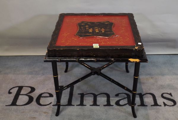 A 19th century Chinese export black and polychrome square box, hinged panel inset lid above compartmented interior on later stand, 59cm wide, 54cm hig