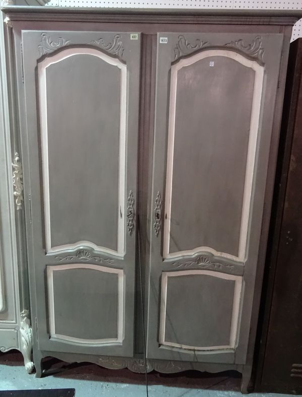 A 19th century and later grey painted French two door armoire, on cabriole supports, 130cm wide x 189cm high.