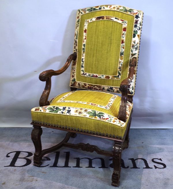 A 17th century Flemish style high back open armchair on square cabriole supports united by 'X' frame stretcher, 66cm wide x 120cm high. 1894