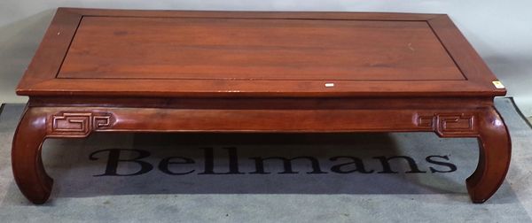 A 20th century Chinese hardwood low table, the rectangular top on inswept supports, 150cm wide x 41cm high.