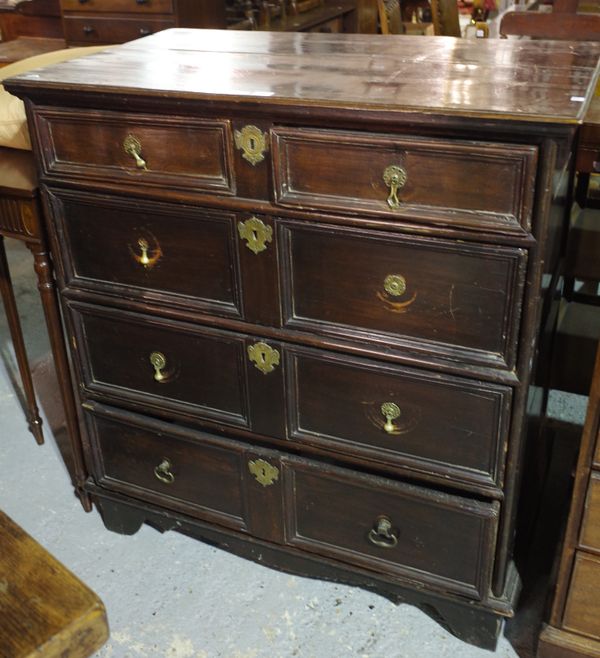 A late 17th century oak chest of four long moulded drawers on block feet, 98cm wide x 105cm high. 1901