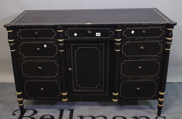 An early Victorian and later black and cream painted rectangular kneehole writing table, nine short drawers about the recessed cupboard, on turned fee