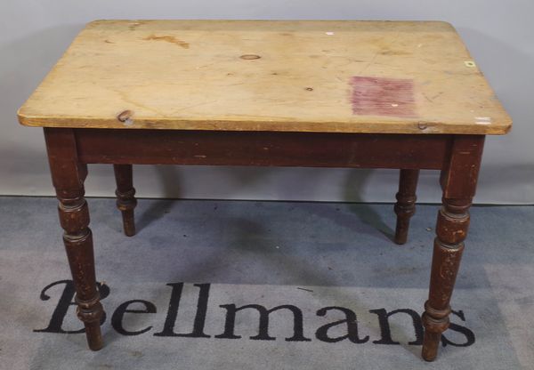 A late Victorian rectangular pine kitchen table on tapering supports, 107cm wide x 76cm high.