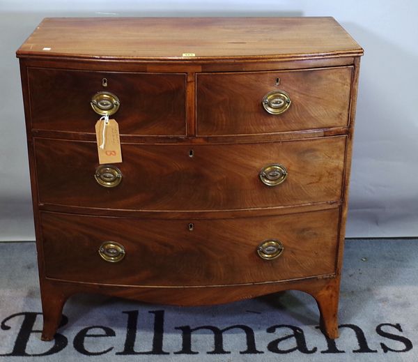 A George III mahogany bowfront chest of two short and two long drawers on splayed bracket feet, 92cm wide x 91cm high.