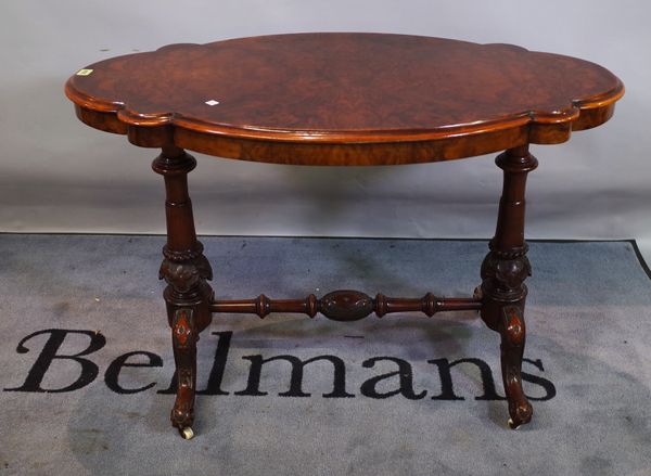 A Victorian walnut centre table on dual ended supports, 102cm wide x 72cm high.