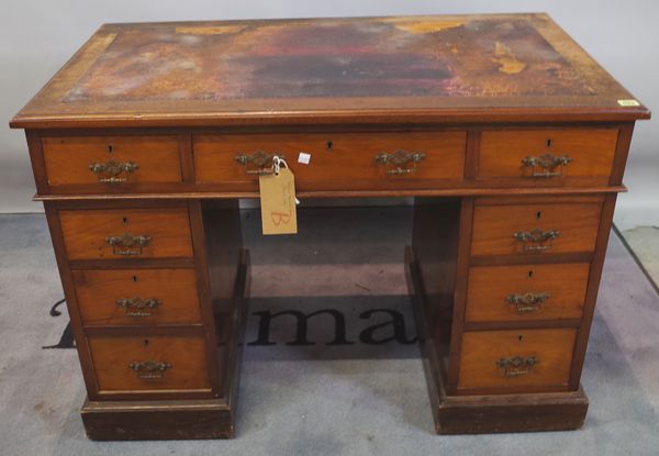 An early 20th century mahogany pedestal desk with tooled leather top, (a.f.), 107cm wide x 70cm high.